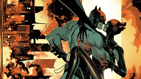 Catwoman claws Batman's back