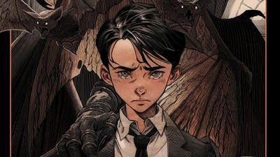 Bruce Wayne cries surrounded by bats